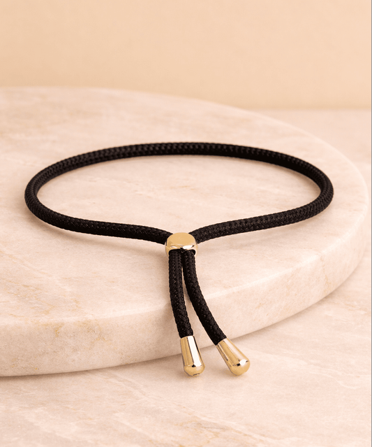 Pulsera Bimba Negra terminaciondes doradas - ZAFFI joyas